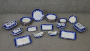 A 19th century Staffordshire blue and white part dinner service, to include ten dinner plates,