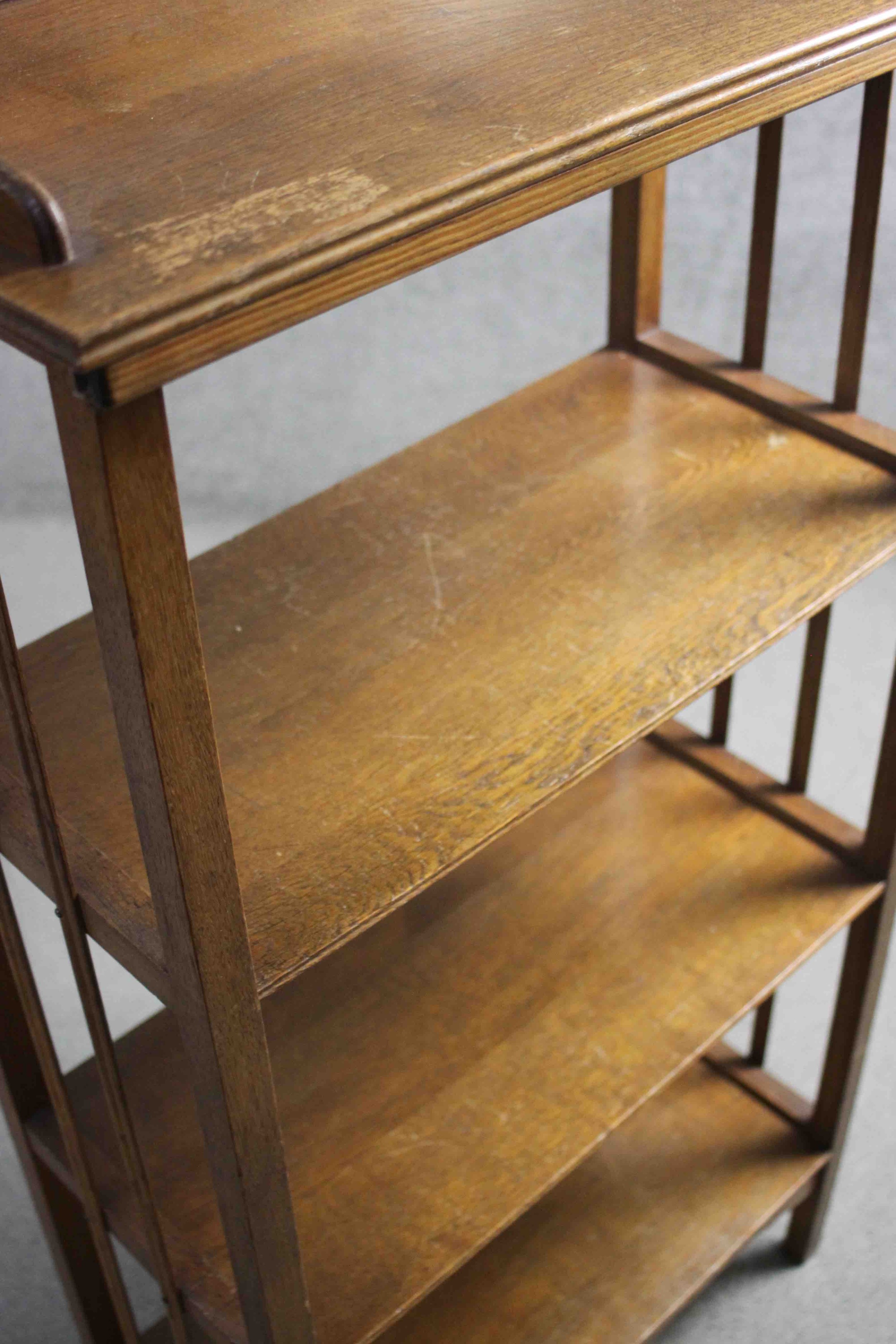 An early 20th century oak open bookcase on square section supports. H.128 W.64 D.32 cm - Image 5 of 5