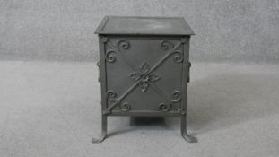 An Arts and Crafts wrought iron framed coal box. H.40 W.33 D.34 cm