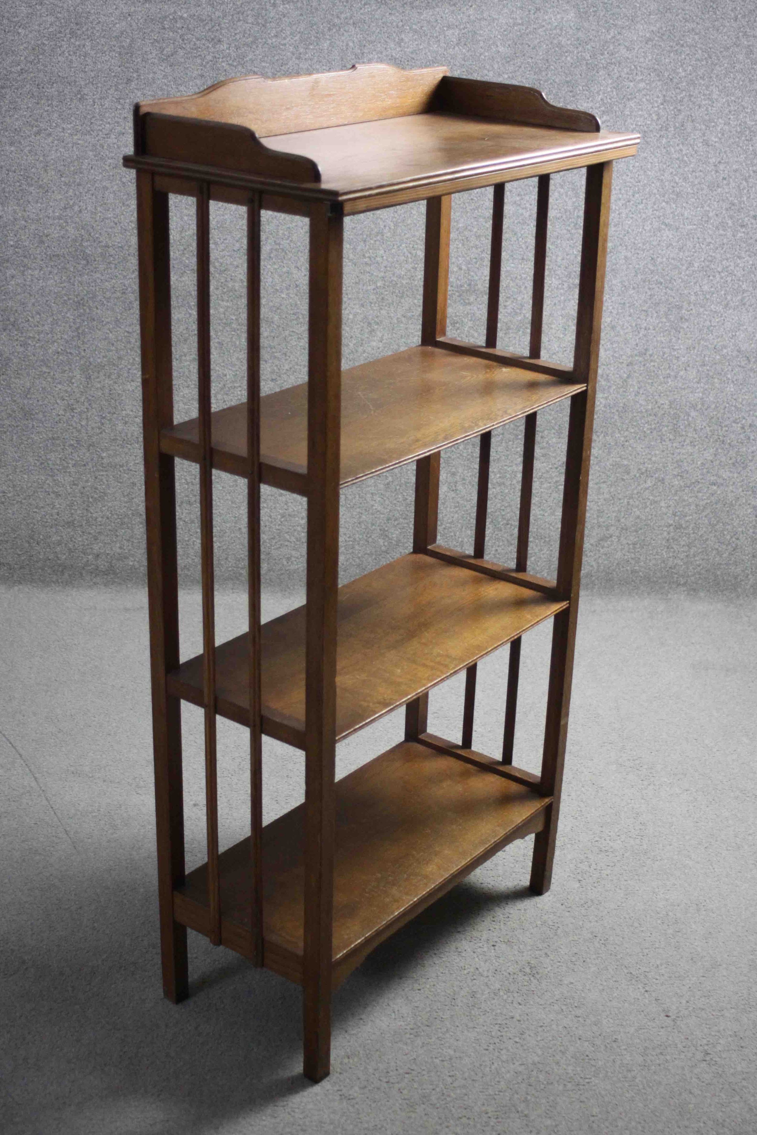 An early 20th century oak open bookcase on square section supports. H.128 W.64 D.32 cm - Image 3 of 5