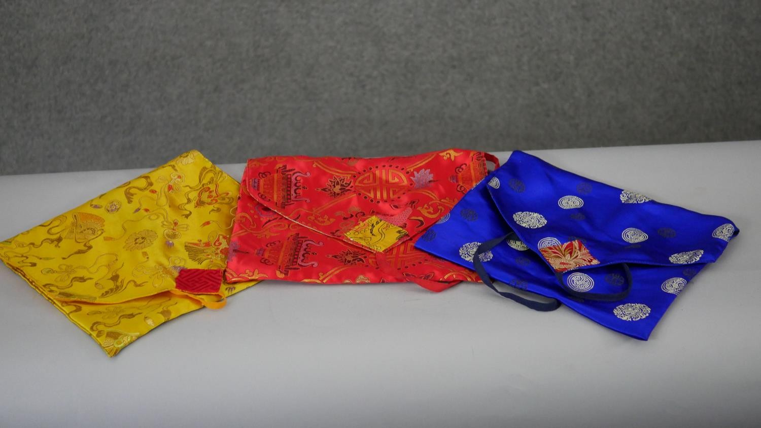 A collection of Tibetan silk bags and Buddhist items along with Native American suede bags with - Image 3 of 6