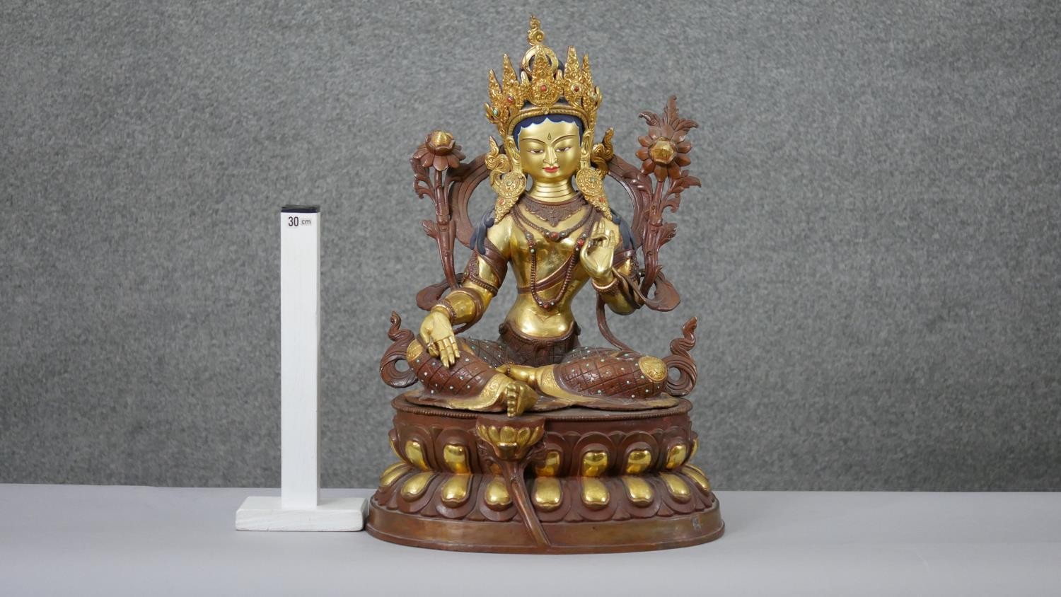 A large 20th century hand painted and gilded copper green Tara figure with hand painted details - Image 2 of 8