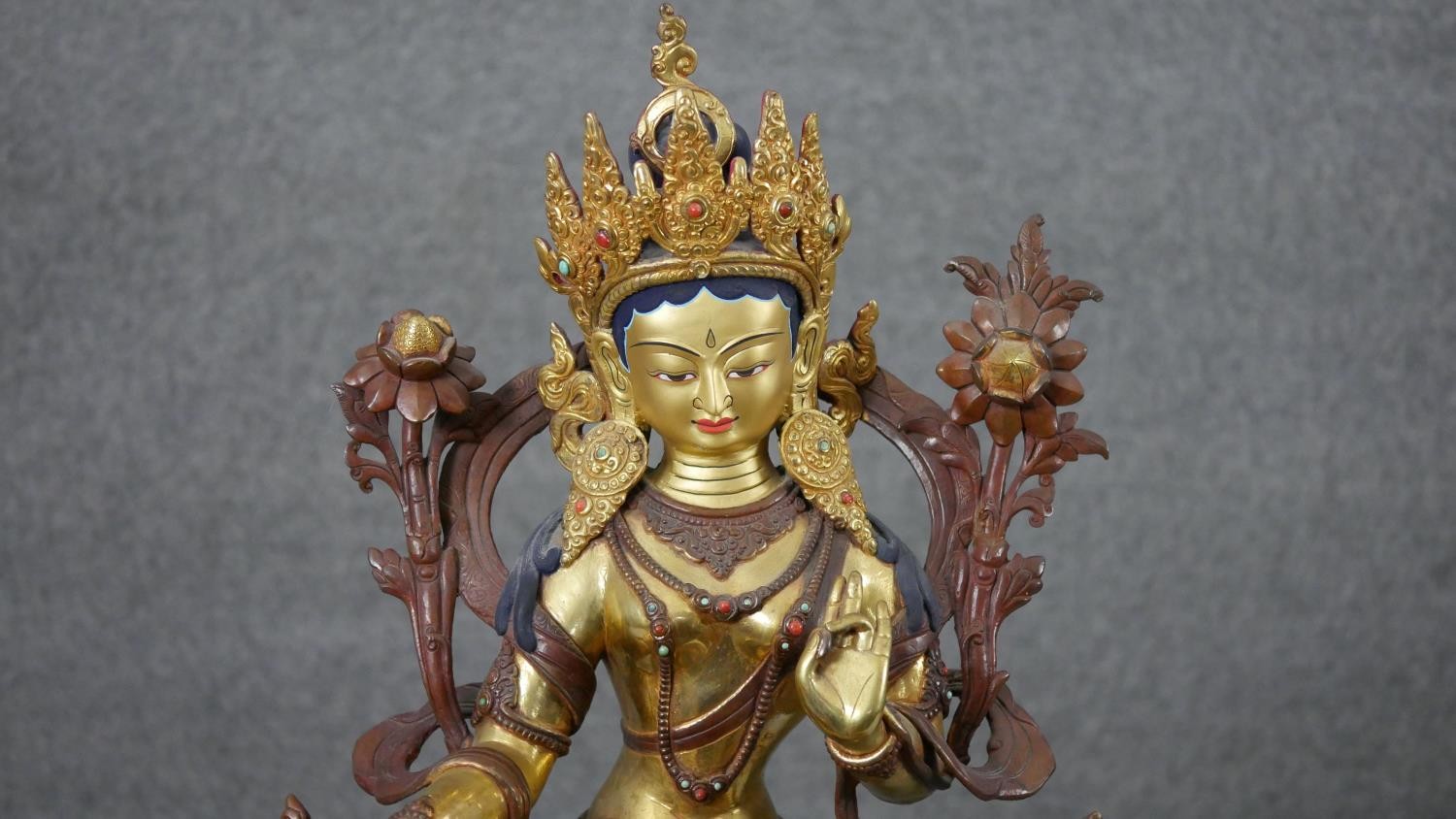 A large 20th century hand painted and gilded copper green Tara figure with hand painted details - Image 3 of 8