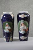 Two early 20th century transfer printed and hand gilded ceramic vases. Each one decorated with a