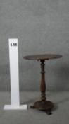A 19th century occasional table on tripod platform base. H.76 W.54 D.40 cm