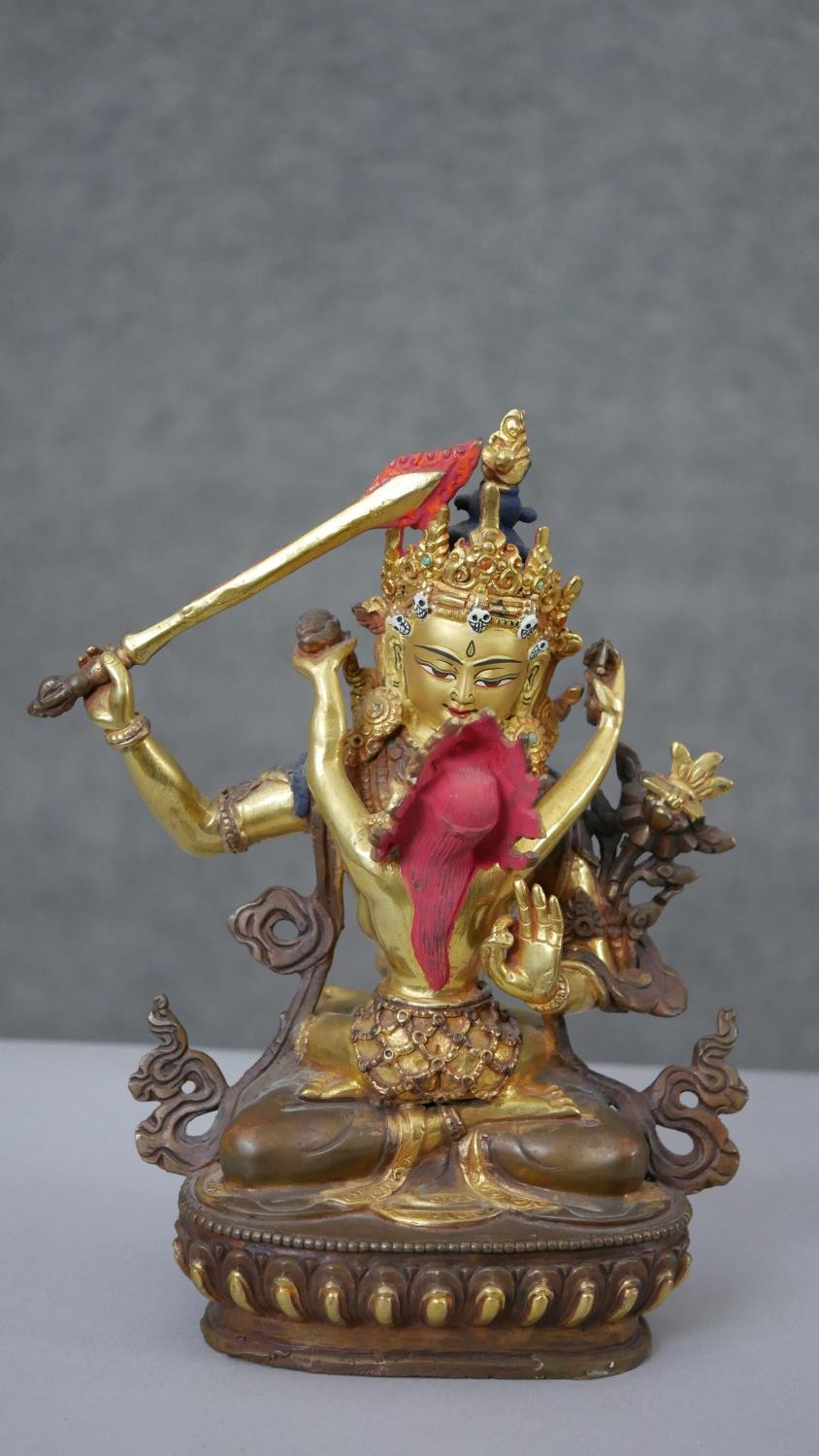 Three Tibetan gilded copper figures with hand painted detail and inlaid with coral and turquoise. - Image 3 of 9