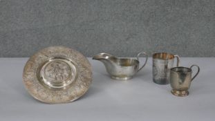 A collection of silver plate. Including an Elkington & Co repousse neoclassical design circular