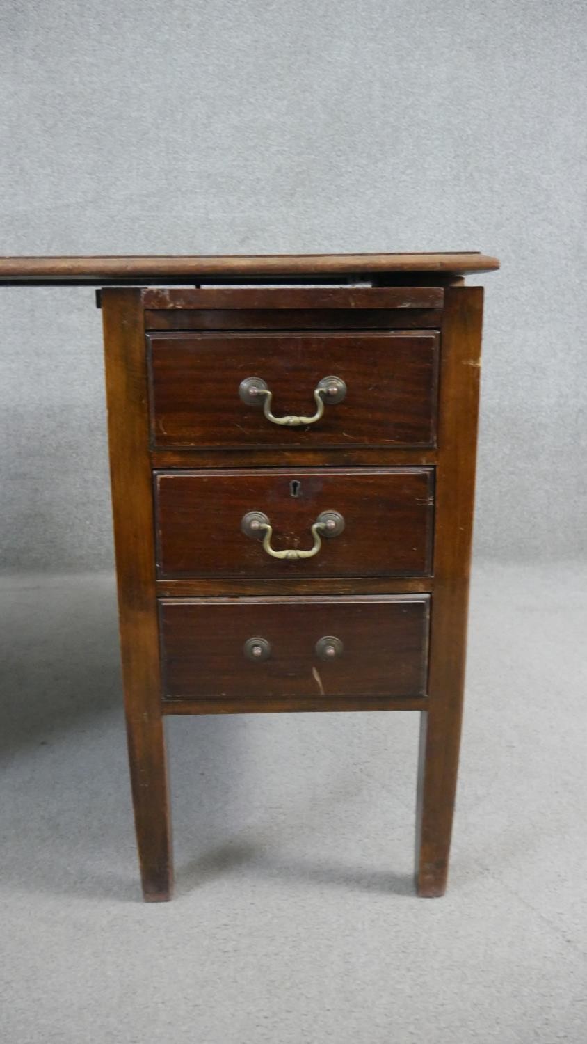 A vintage mahogany three section pedestal desk. H.75 W.136 D.82cm (With faults, as photographed). - Image 7 of 8