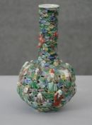 A late 19th/early 20th century Chinese Famille Verte glazed figural vase with coloured stylised