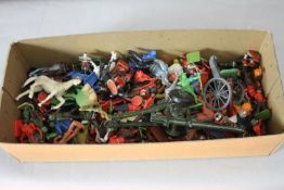 A box of die cast figures and plastic miniature toys. H.10 W38 D.16 cm.