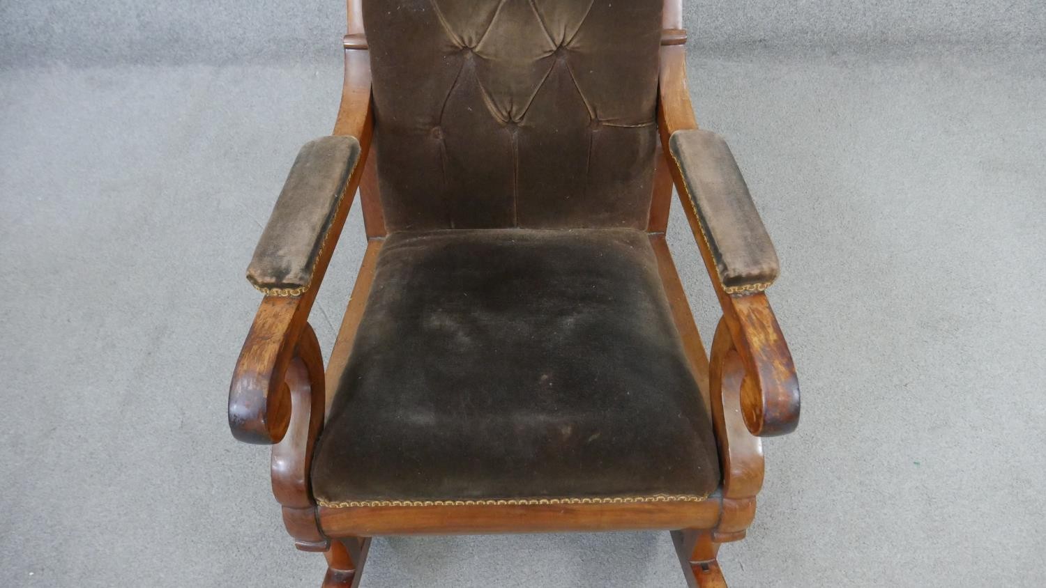 A 19th century mahogany framed rocking chair in buttoned velour upholstery. - Image 3 of 6