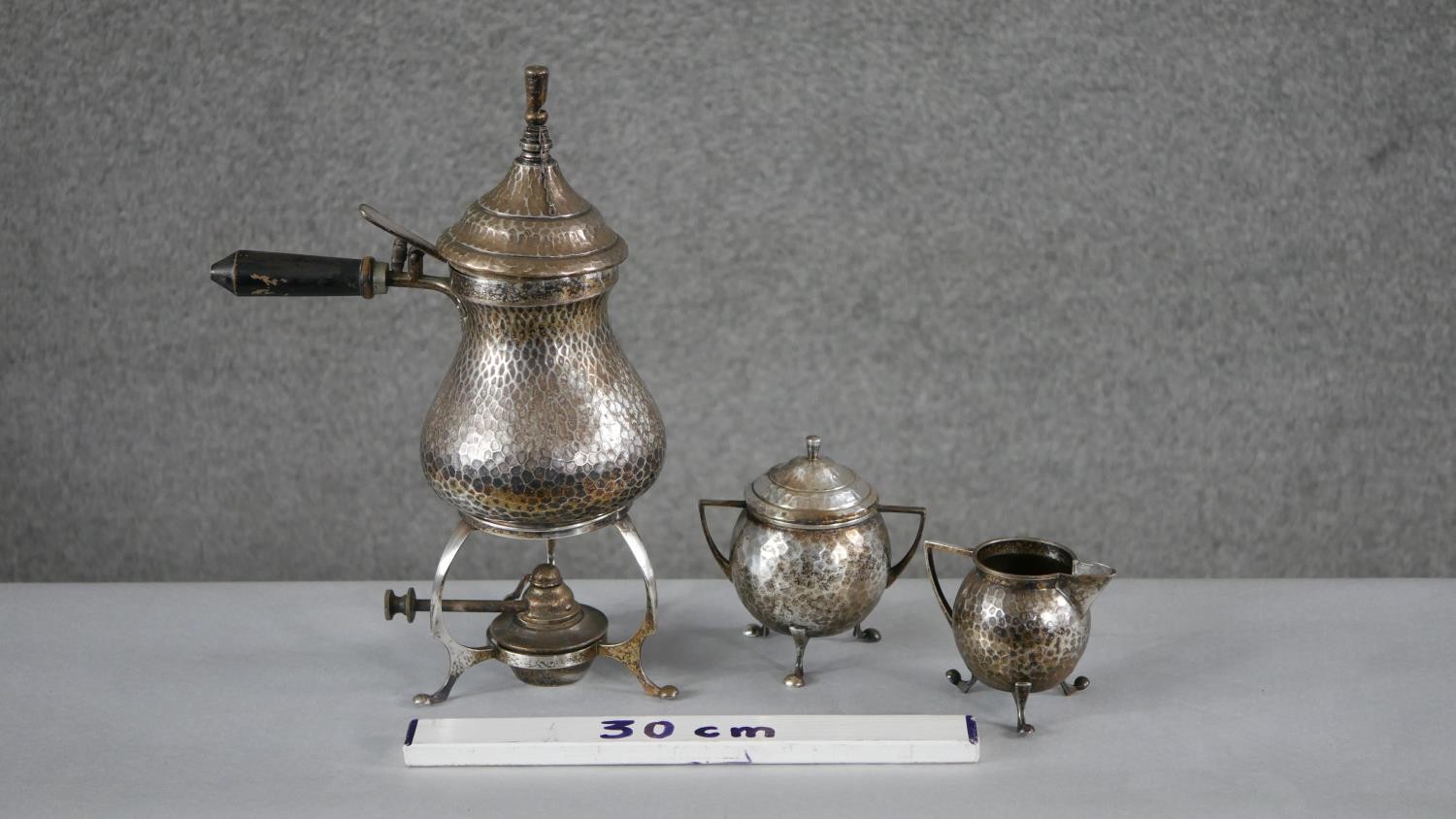 A late 19th century Arts and Crafts three piece Continental hammered silver plate coffee set. - Image 5 of 5