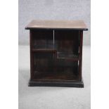 A mahogany and crossbanded open bookcase cabinet. H.53 D.53 D.53 cm