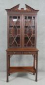 A C.1900 mahogany Chinese Chippendale style display cabinet by Edwards and Roberts with upper