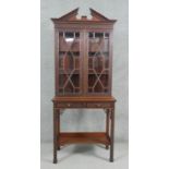 A C.1900 mahogany Chinese Chippendale style display cabinet by Edwards and Roberts with upper
