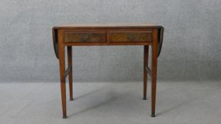 A Georgian style burr walnut drop flap sofa table. H.74 W.85 D.50 cm (W.130 cm extended)