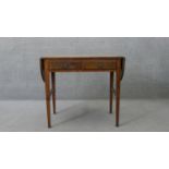 A Georgian style burr walnut drop flap sofa table. H.74 W.85 D.50 cm (W.130 cm extended)