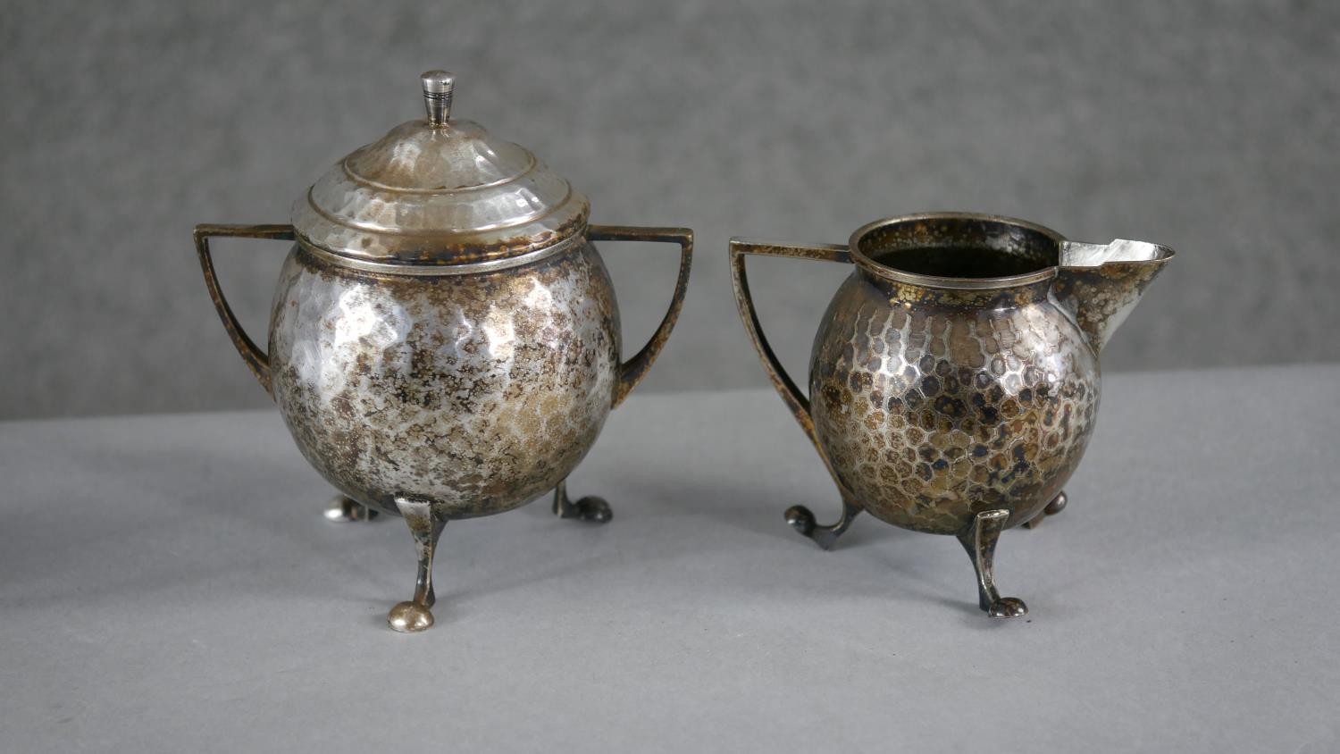 A late 19th century Arts and Crafts three piece Continental hammered silver plate coffee set. - Image 2 of 5