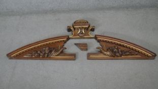 A walnut and gilt architectural pediment with carved shell and cornucopia decoration. H.164 W.66 cm