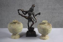 A 19th century brass figure of Shiva on square pedestal along with a pair of carved alabaster lidded