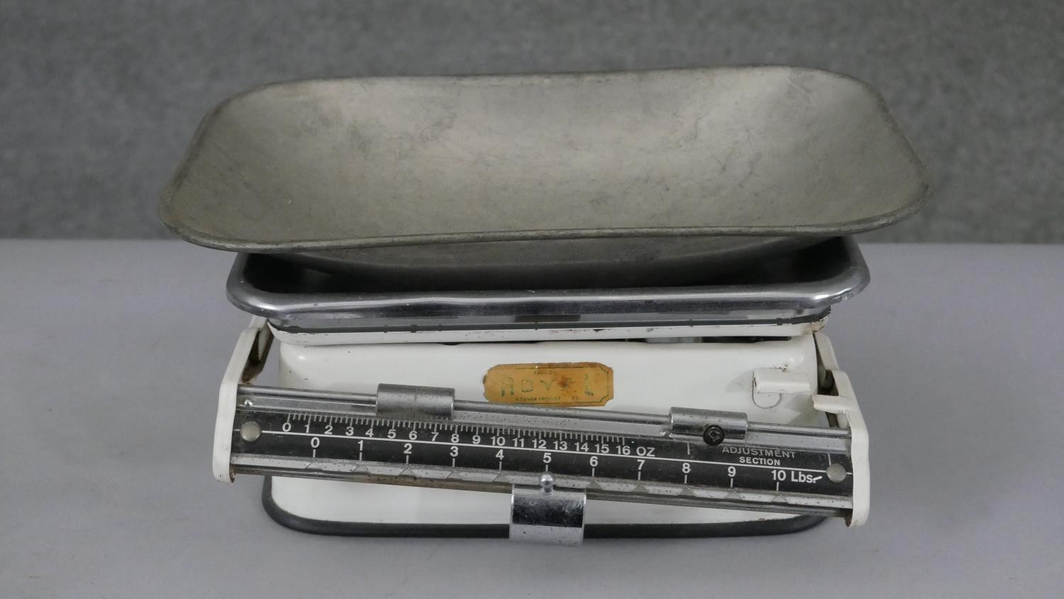 A collection of six irons and two sets of shop scales, one by Royal. H.13 W.28 D.17cm (largest) - Image 5 of 7