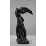 A cast black painted moulded figure of the Nike of Samothrace. H.56 W.30 D.17 cm