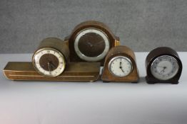 Four vintage teak and bakelite mantle clocks. Two by Smiths and one by Timco. H.20 W.26 cm. (