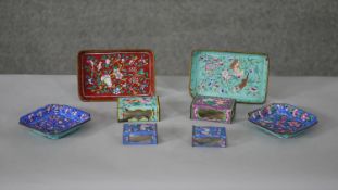 A collection of Qing dynasty Canton enamel pieces. Including four match box holders and four