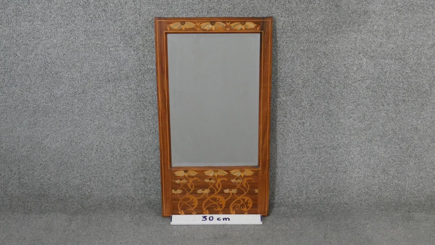 A pier mirror with bevelled plate in Arts and Crafts style floral inlaid frame. H.66 W.35 cm - Image 2 of 7