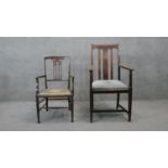 A 19th century mahogany armchair with tapestry seat along with a later oak example.