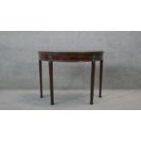 A 19th century mahogany and satinwood crossbanded card table on double gateleg square tapering