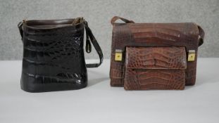 Two vintage brown leather bags. One alligator skin with internal compartments and a leather bucket