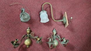 Four vintage wall mounted light fittings. A pair of two branch brass wall lights with scrolling