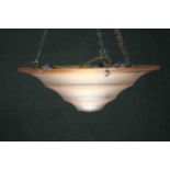 An Art Deco conical frosted peach glass ceiling pendant light shade with chain fittings. H.14