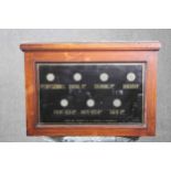 An early 1900?s Julius Sax, Russel St, London mahogany framed country house servant's bell panel
