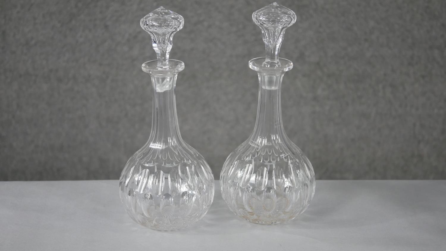 Four 19th century petal cut crystal decanters with stoppers. (two original) H.22 W.12cm (largest) - Image 3 of 6