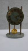 A vintage green marble and brass mantle clock with black Roman numerals. H.30 W.20cm