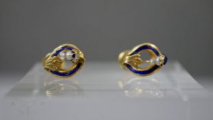 A pair of French 19th century seed pearl and blue enamel 18 carat yellow gold stud earrings.
