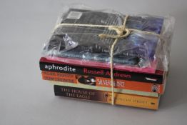 A collection of seven books. Including Aphrodite by Russell Andrews (uncorrected proof), Silverheart
