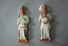 A pair of Romano-Egyptian style hand painted stucco figures. H.20 W.6 cm