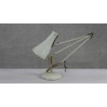 A vintage Herbert Terry anglepoise grey enamel on metal table lamp, makers stamp. (damaged) H.77 W.