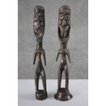Two patinated spelter African tribal bronze figures. H.43 cm.