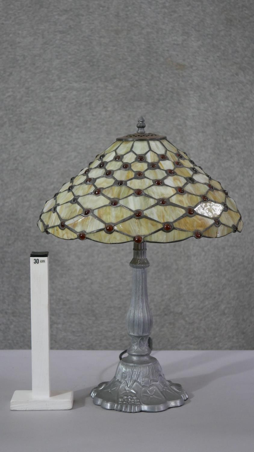 A vintage Tiffany style leaded stained glass table lamp with pewter waterlily design base. H.57 - Image 2 of 6