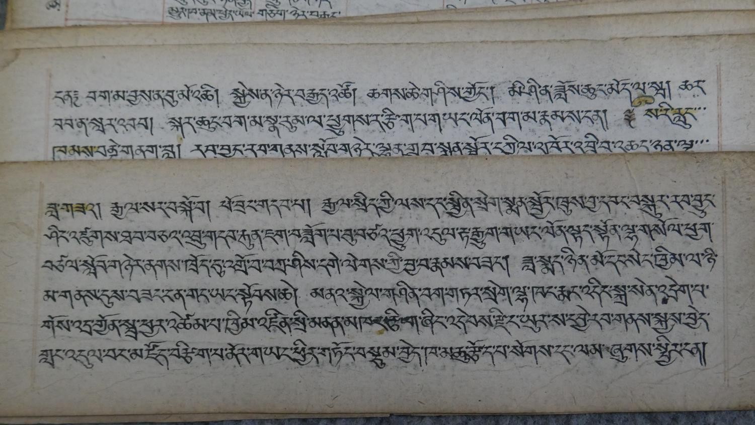 A 19th century hand written Tibetan manuscript on parchment. L.7 W.23 cm - Image 4 of 4