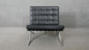 A contemporary Barcelona style chair in leather upholstery.