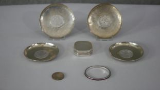 A collection of silver and silver plate. Including a set of four silver plated dishes inset with