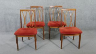 A set of four mid century vintage teak G-Plan Fresco dining chairs with maker's label to the