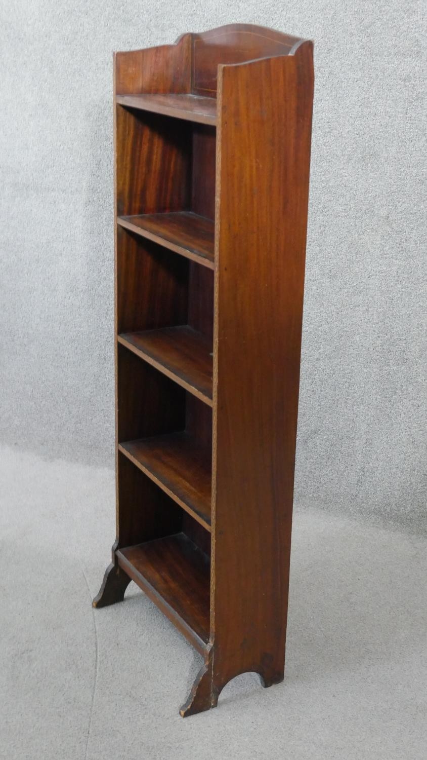 An Edwardian mahogany and satinwood strung narrow open bookcase on shaped supports. H.117 W.41 D.17 - Image 5 of 5