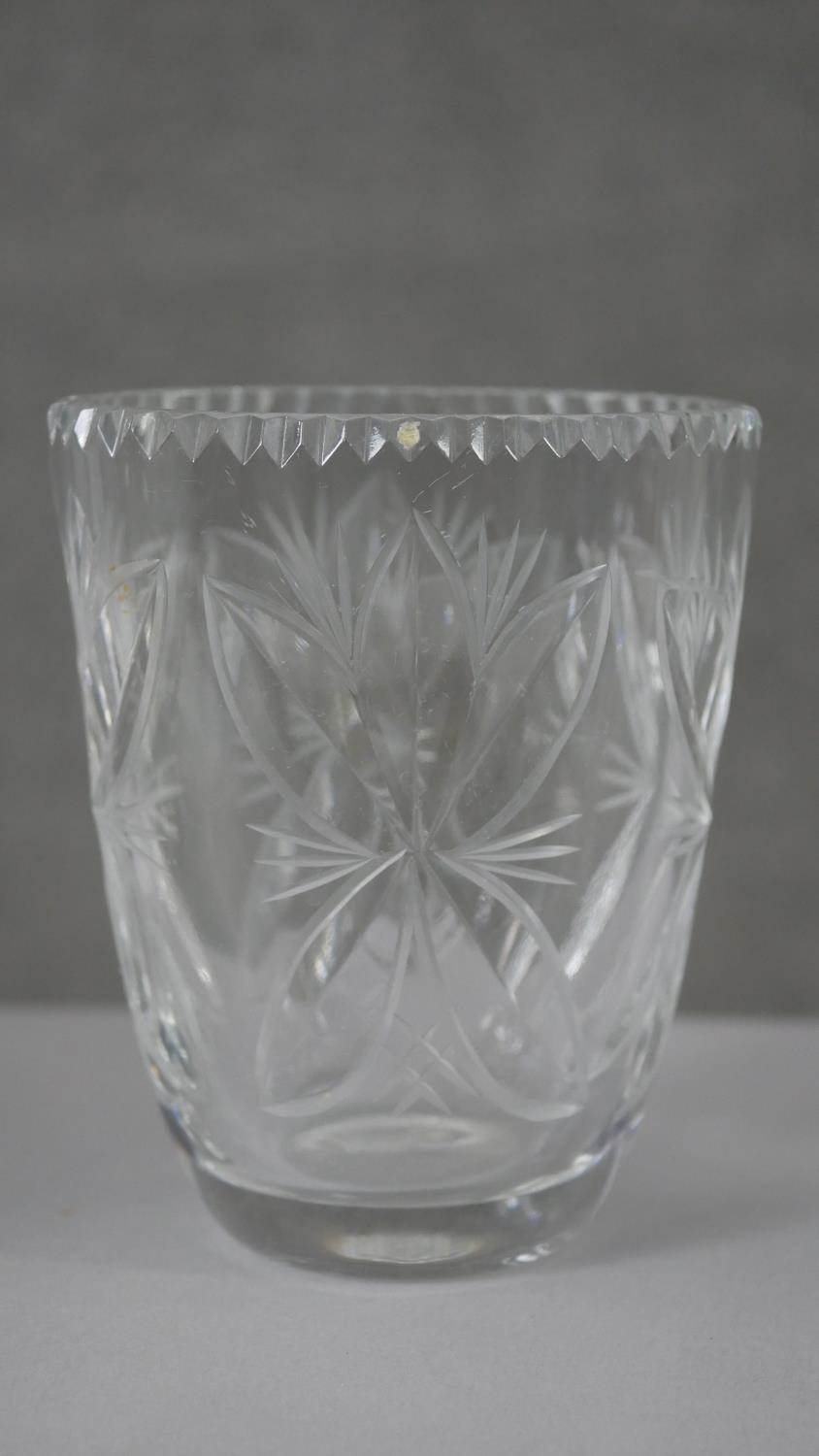 A collection of four cut crystal flower vases with stylised foliate design. H.20 Diam.15cm (largest) - Image 7 of 8