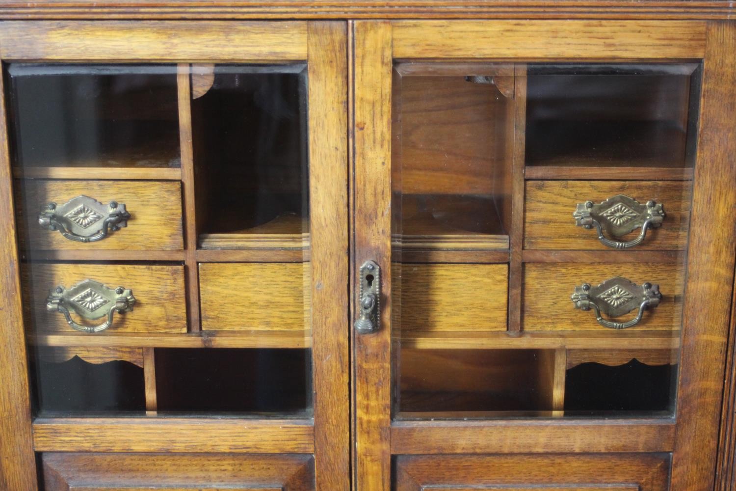 A 19th century oak table cabinet with glazed doors enclosing fitted interior on shaped bracket feet. - Image 3 of 8